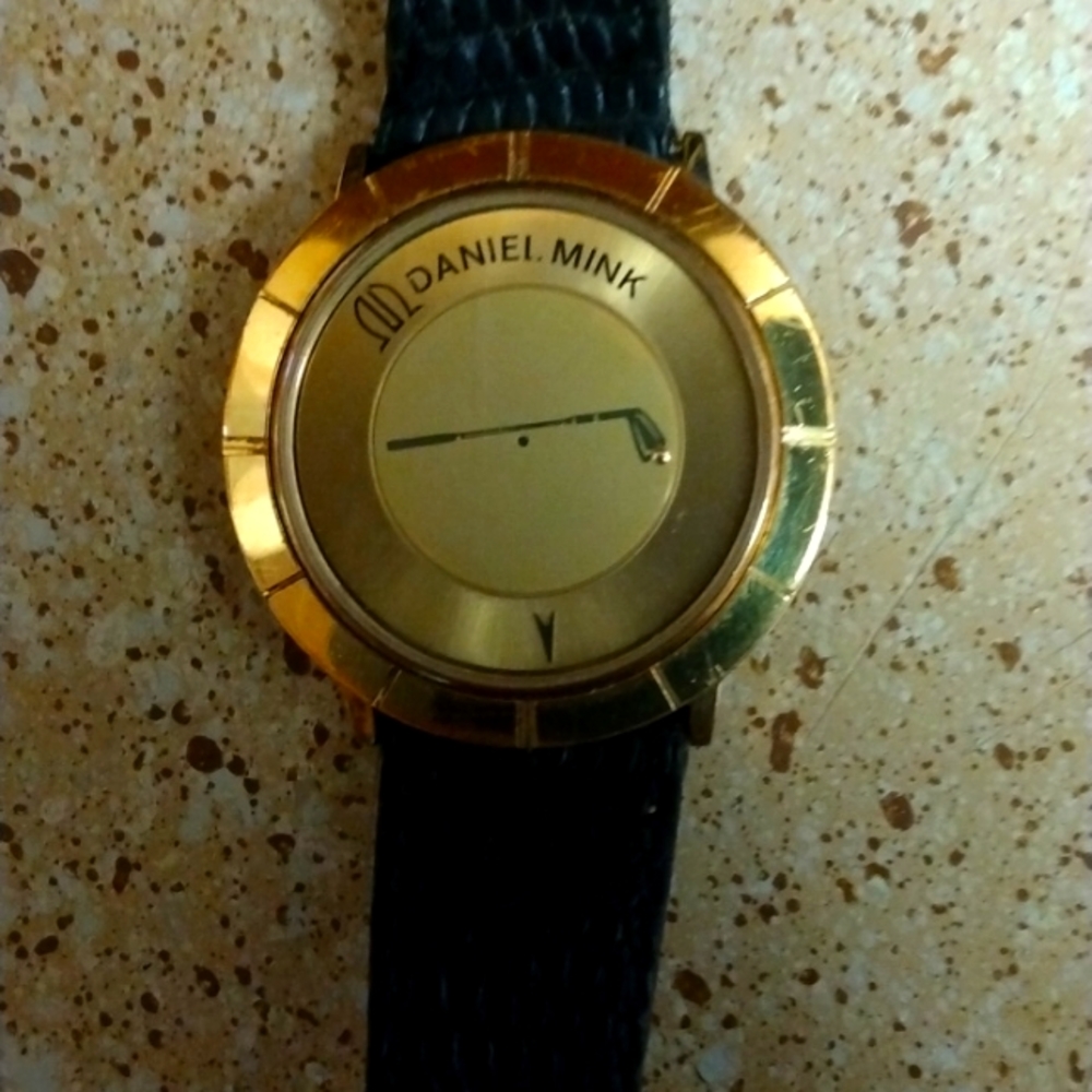 Daniel Mink custom gold 45 year old golf club watch with lizard band